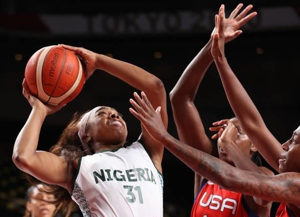 Erinma Ogwumike of Team Nigeria is pressured by the United States of America during a Women's Preliminary Round Group B game on day four of the Tokyo...