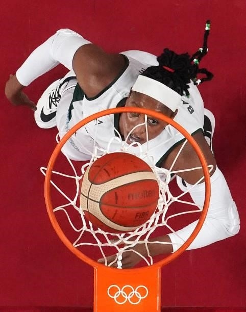 Elizabeth Balogun of Team Nigeria watches the ball go through the basket against United States of America during a Women's Preliminary Round Group B...