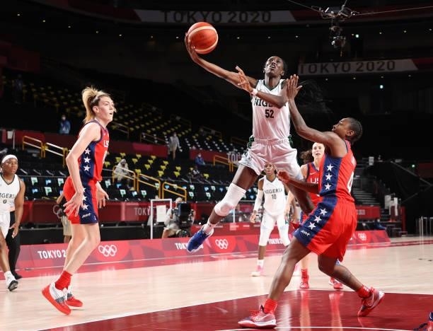 Ify Ibekwe of Team Nigeria goes up for a shot against United States of America during a Women's Preliminary Round Group B game on day four of the...
