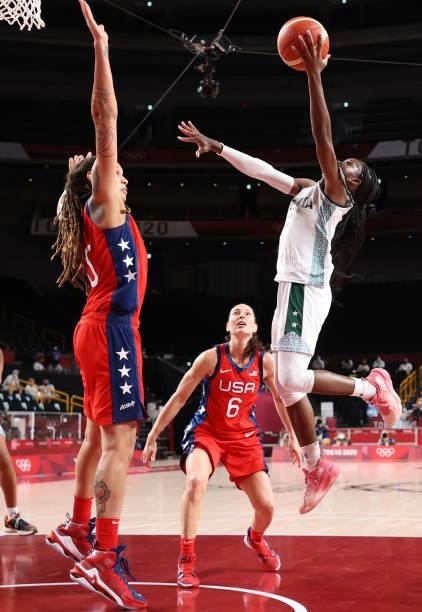 Promise Amukamara of Team Nigeria goes up for a shot against Brittney Griner of Team United States during a Women's Preliminary Round Group B game on...