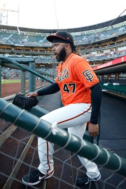 Pitcher Johnny Cueto of the San Francisco Giants leaves the dugout before the game against the Pittsburgh Pirates at Oracle Park on July 23, 2021 in...