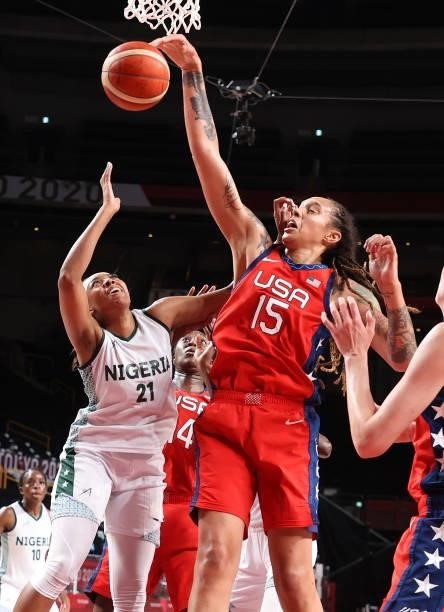 Brittney Griner of Team United States knocks down a shot against Atonye Nyingifa of Team Nigeria during a Women's Preliminary Round Group B game on...