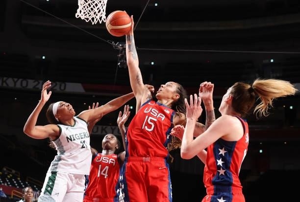 Brittney Griner of Team United States knocks down a shot against Atonye Nyingifa of Team Nigeria during a Women's Preliminary Round Group B game on...