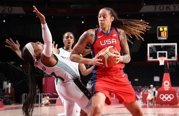 Brittney Griner of Team United States knocks down Ezinne Kalu of Team Nigeria during the second half of a Women's Preliminary Round Group B game on...
