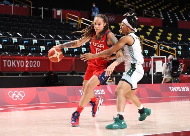 Brittney Griner of Team United States drives to the basket agasint Pallas Kunaiyi-Akpanah of Team Nigeria during the second half of a Women's...