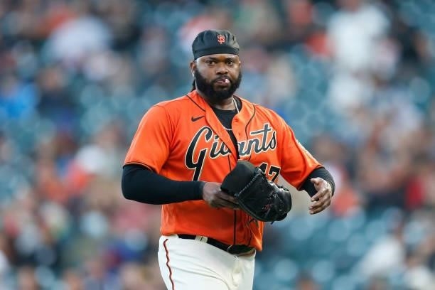 Pitcher Johnny Cueto of the San Francisco Giants looks on between innings against the Pittsburgh Pirates at Oracle Park on July 23, 2021 in San...