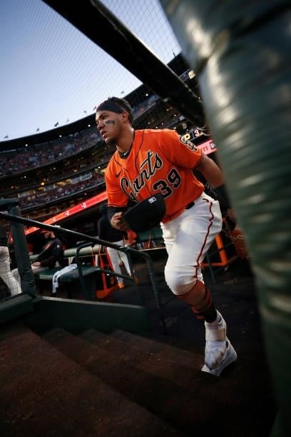 Thairo Estrada of the San Francisco Giants walks out from the dugout during the game against the Pittsburgh Pirates at Oracle Park on July 23, 2021...