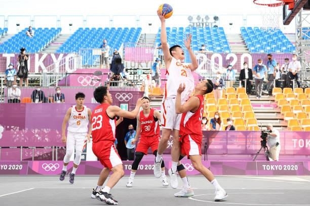 Jinqiu Hu of Team China drives to the basket in the 3x3 Basketball competition on day four of the Tokyo 2020 Olympic Games at Aomi Urban Sports Park...