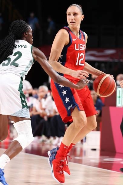 Diana Taurasi of Team United States sets up a play against Ify Ibekwe of Team Nigeria during the second half of a Women's Preliminary Round Group B...