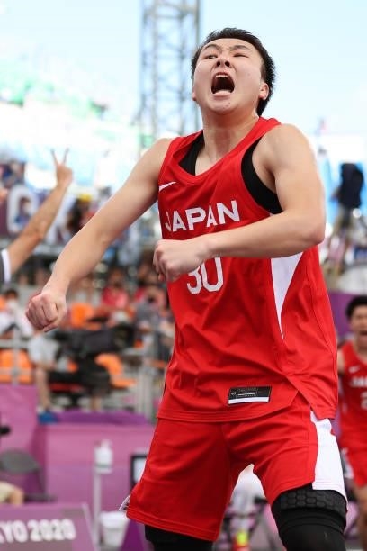 Keisei Tominaga of Team Japan celebrates victory in the 3x3 Basketball competition on day four of the Tokyo 2020 Olympic Games at Aomi Urban Sports...