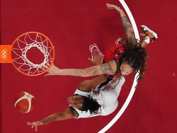 Oderah Chidom of Team Nigeria goes up for a shot against Brittney Griner of Team United States during the second half of a Women's Preliminary Round...