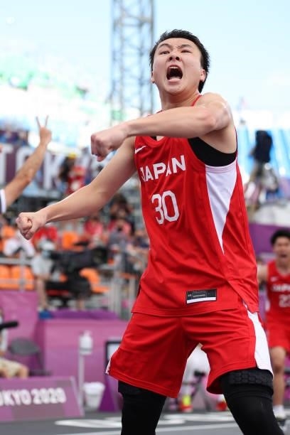 Keisei Tominaga of Team Japan celebrates victory in the 3x3 Basketball competition on day four of the Tokyo 2020 Olympic Games at Aomi Urban Sports...