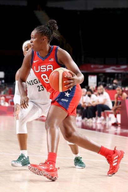 Chelsea Gray of Team United States drives to the basket against Ezinne Kalu of Team Nigeria during the second half of a Women's Preliminary Round...