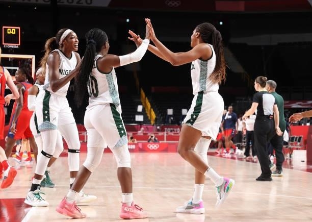 Promise Amukamara and Adaora Elonu of Team Nigeria celebrate against United States of America during a Women's Preliminary Round Group B game on day...