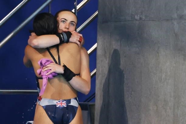Lois Toulson and Eden Cheng Team of Great Britain embrace after their final dive during the Women's Synchronised 10m Platform Final on day four of...
