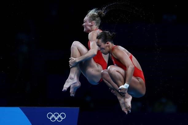 Delaney Schnell and Jessica Parratto of Team United States compete during the Women's Synchronised 10m Platform Final on day four of the Tokyo 2020...