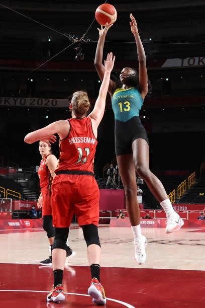 Ezi Magbegor of Team Australia shoots over Emma Meesseman of Team Belgium during the first half of a Women's Preliminary Round Group C game on day...