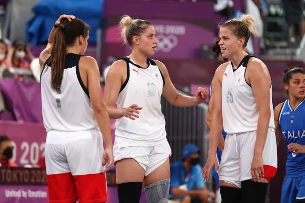 Evgeniia Frolkina of Team ROC and Olga Frolkina of Team ROC react after victory in the 3x3 Basketball competition on day four of the Tokyo 2020...