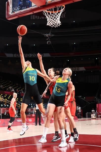 Katie Ebzery of Team Australia drives to the basket for a layup as teammate Cayla George looks on against Belgium during the first half of a Women's...
