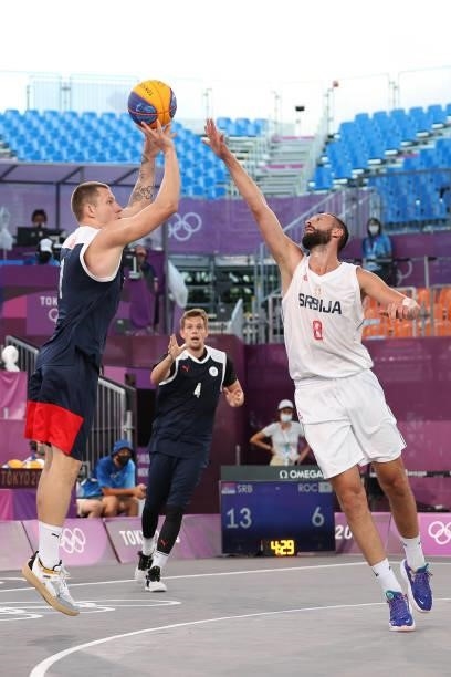 Stanislav Sharov of Team ROC shoots against Dejan Majstorovic of Team Serbia in the 3x3 Basketball competition on day four of the Tokyo 2020 Olympic...