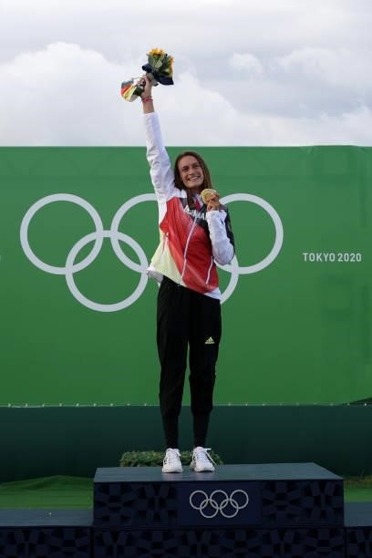 Gold medalist Ricarda Funk of Team Germany celebrates during the medal ceremony following the Women's Kayak Slalom Final on day four of the Tokyo...