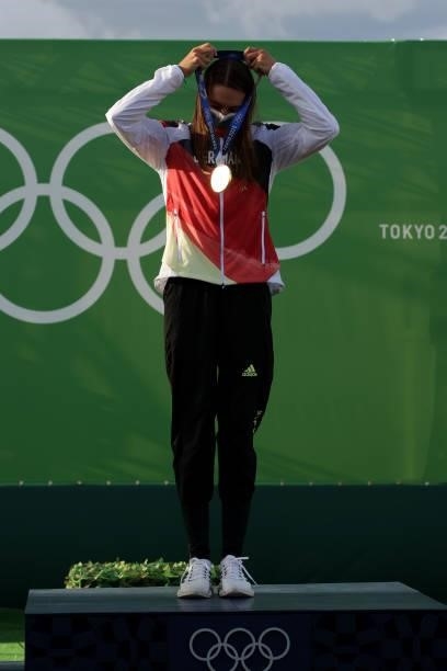 Gold medalist Ricarda Funk of Team Germany celebrates during the medal ceremony following the Women's Kayak Slalom Final on day four of the Tokyo...