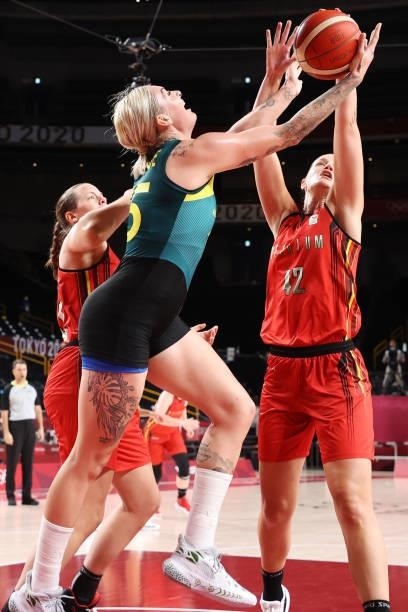 Cayla George of Team Australia and Jana Raman of Team Belgium fight for possession of a rebound during the first half of a Women's Preliminary Round...