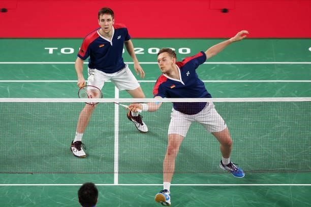 Mark Lamsfuss and Marvin Seidel of Team Germany compete against Phillip Chew and Ryan Chew of Team United States during a Men's Doubles Group C match...