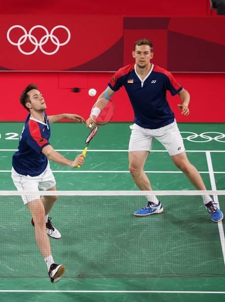 Mark Lamsfuss and Marvin Seidel of Team Germany compete against Phillip Chew and Ryan Chew of Team United States during a Men's Doubles Group C match...