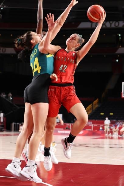 Jana Raman of Team Belgium drives to the basket against Marianna Tolo of Team Australia during the second half of a Women's Preliminary Round Group C...