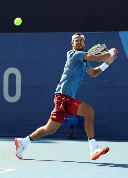 Karen Khachanov of Team ROC plays a backhand during his Men's Singles Second Round match against James Duckworth of Team Australia on day four of the...