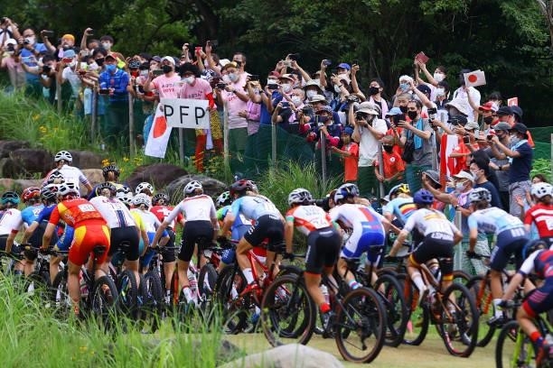 General view of the peloton during the Women's Cross-country race on day four of the Tokyo 2020 Olympic Games at Izu Mountain Bike Course on July 27,...