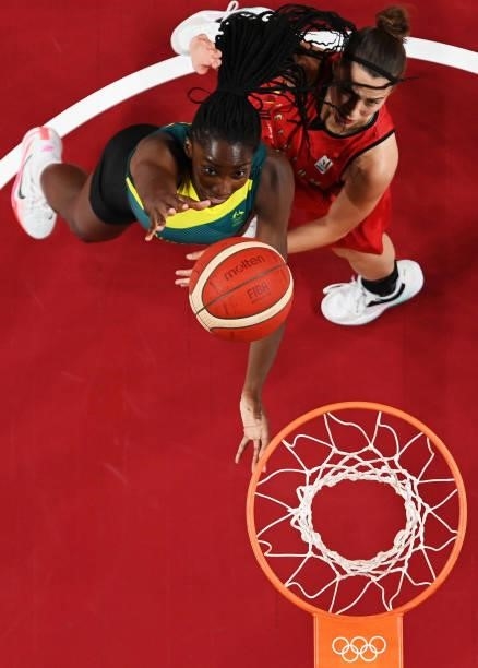 Ezi Magbegor of Team Australia drives past Antonia Delaere of Team Belgium during the first half of a Women's Preliminary Round Group C game on day...