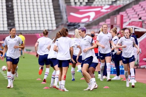 Megan Rapinoe of Team United States warms up with teammates prior to the Women's Football Group G match between United States and Australia on day...