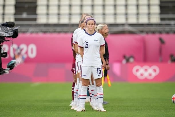 Megan Rapinoe of Team United States stands at attention during the national anthem before a game between Australia and USWNT at Ibaraki Kashima...