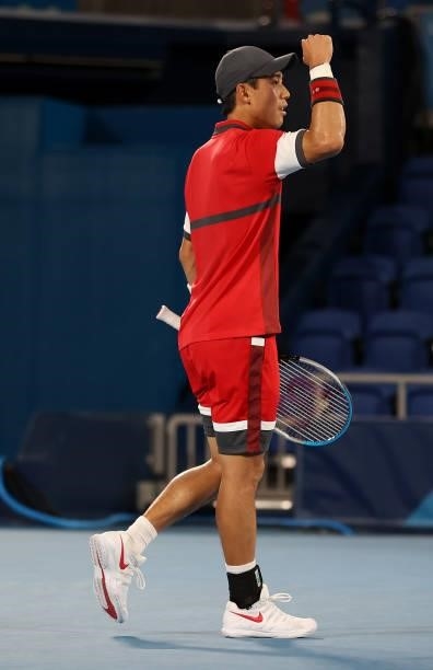 Kei Nishikori of Team Japan celebrates after match point during his Men's Singles Second Round match against Marcos Giron of Team USA on day four of...