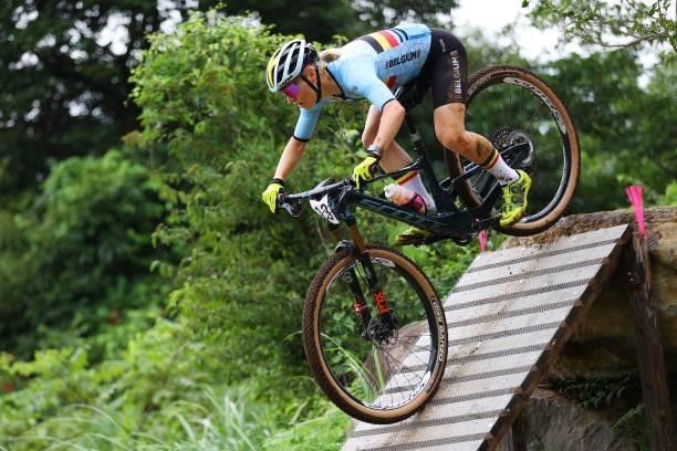 Githa Michiels of Team Belgium jumps during the Women's Cross-country race on day four of the Tokyo 2020 Olympic Games at Izu Mountain Bike Course on...