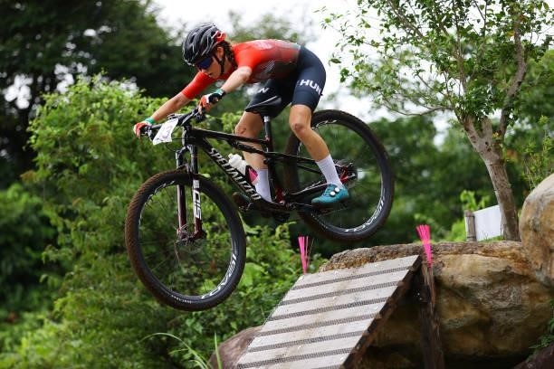 Kata Blanka Vas of Team Hungary jumps during the Women's Cross-country race on day four of the Tokyo 2020 Olympic Games at Izu Mountain Bike Course...