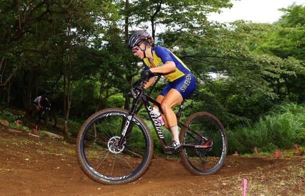 Jenny Rissveds of Team Sweden rides during the Women's Cross-country race on day four of the Tokyo 2020 Olympic Games at Izu Mountain Bike Course on...