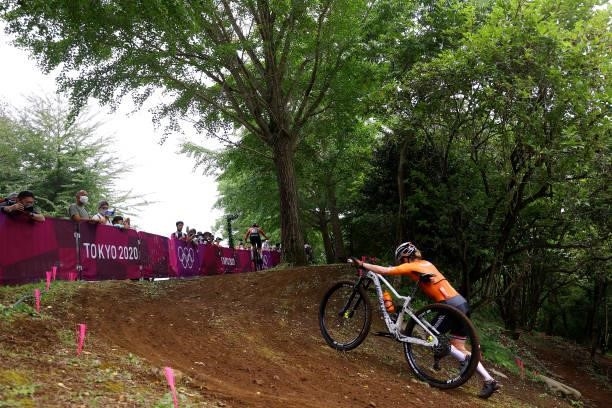 Anne Tauber of Team Netherlands rides during the Women's Cross-country race on day four of the Tokyo 2020 Olympic Games at Izu Mountain Bike Course...