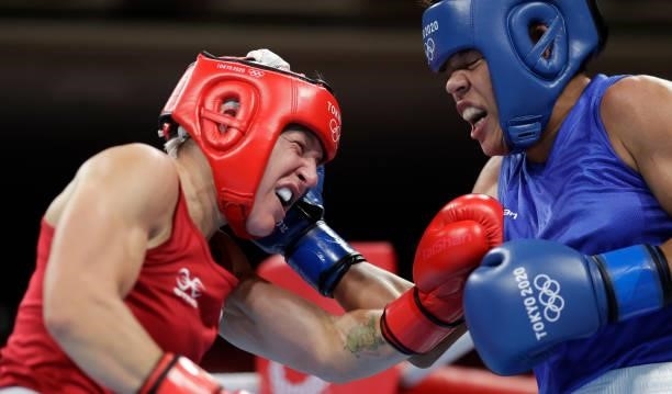 Myriam da Silva of Canada exchanges punches with Maria Altagracia Moronta Hernandez of Dominican Republic during the Women's Welter on day four of...