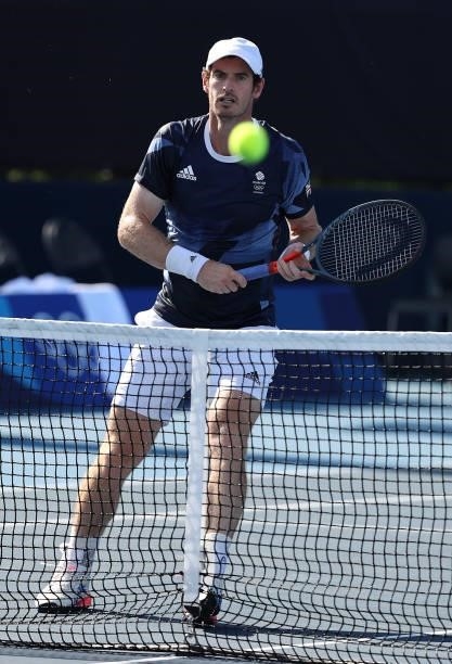 Andy Murray of Team Great Britain plays a volley during his Men's Doubles Second Round match with Joe Salisbury of Team Great Britain against Tim...