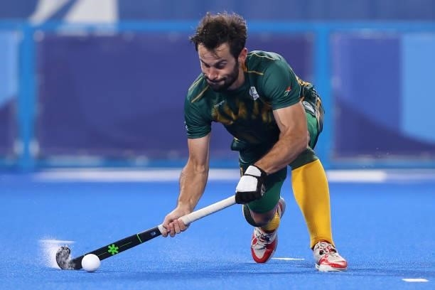 Jethro Ray Eustice of Team South Africa passes the ball during the Men's Preliminary Pool B match between Belgium and South Africa on day four of the...