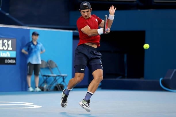 Marcos Giron of Team USA plays a forehand during his Men's Singles Second Round match against Kei Nishikori of Team Japan on day four of the Tokyo...