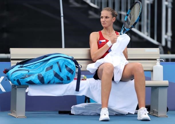 Karolina Pliskova of Team Czech Republic sits between breaks in games during her Women's Singles Third Round match against Camila Giorgi of Team...
