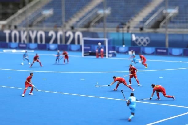 Ricardo Sanchez Herrero of Team Spain moves the ball past of Team during the Men's Preliminary Pool A match between India and Spain on day four of...