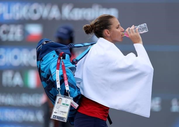 Karolina Pliskova of Team Czech Republic leaves the court after defeat in her Women's Singles Third Round match against Camila Giorgi of Team Italy...