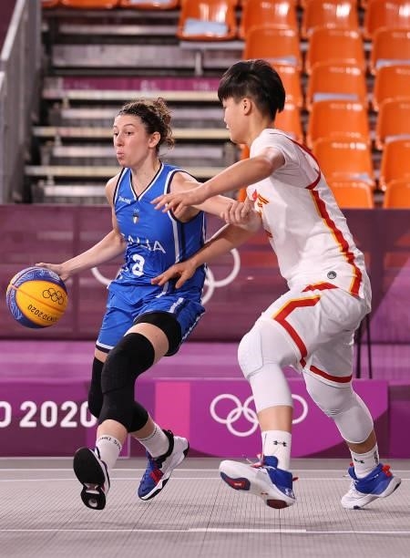 Giulia Rulli of Team Italy handles the ball against Jiyuan Wan of Team China in the 3x3 Basketball competition on day four of the Tokyo 2020 Olympic...