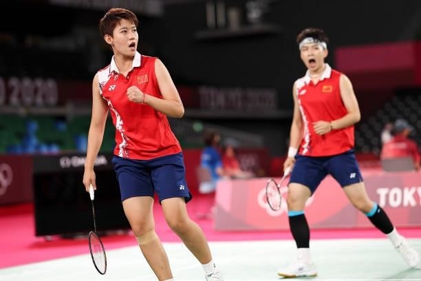 Du Yue and Li Yin Hui of Team China react as they compete against Lee Sohee and Shin Seungchan of Team South Korea during a Women's Doubles Group B...