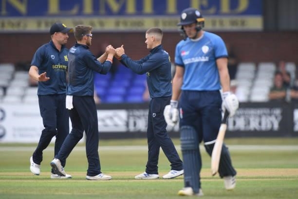Jacob Bethell of Warwickshire celebrates bowling out Tom Wood of Derbyshire during the Royal London Cup match between Derbyshire and Warwickshire at...